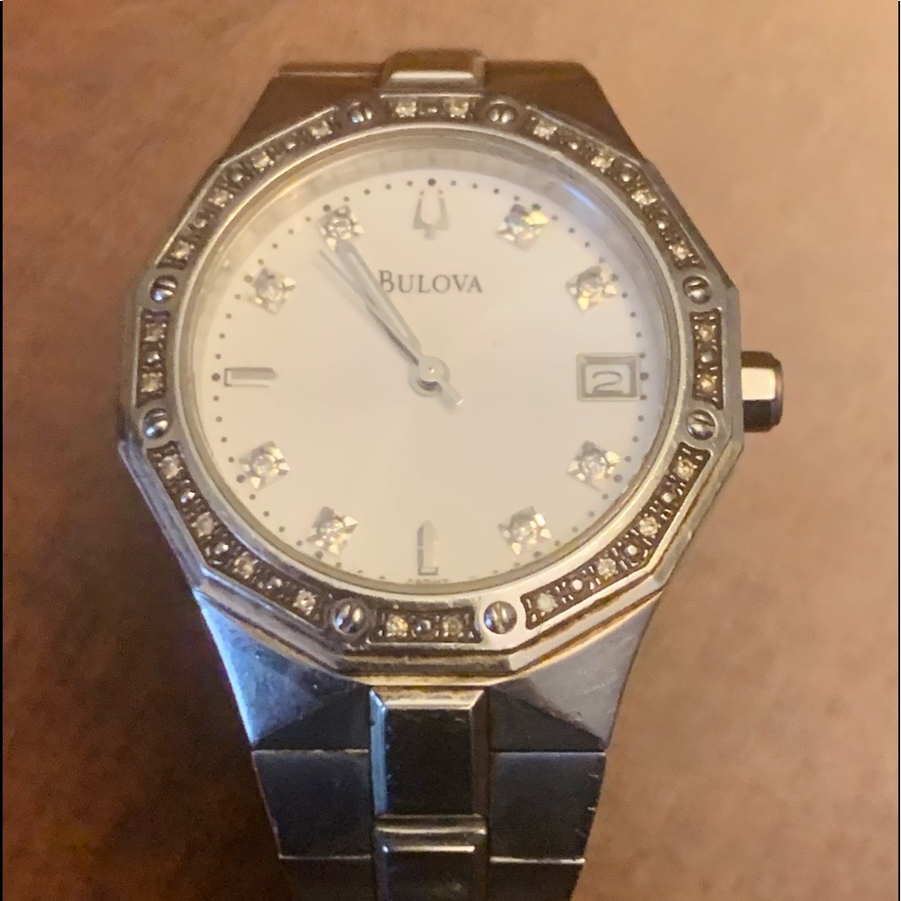 Silver tone elegant Bulova watch needs battery.